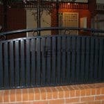 SF46 - Black Vertical Slats with Feature Ring Steel Fencing Infills