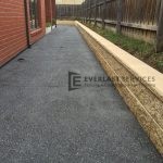 EA8 - Dark Exposed Aggregate Side of House