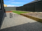 Back-yard-Exposed-Aggregate-with-Synthetic-Grass-and-Decking