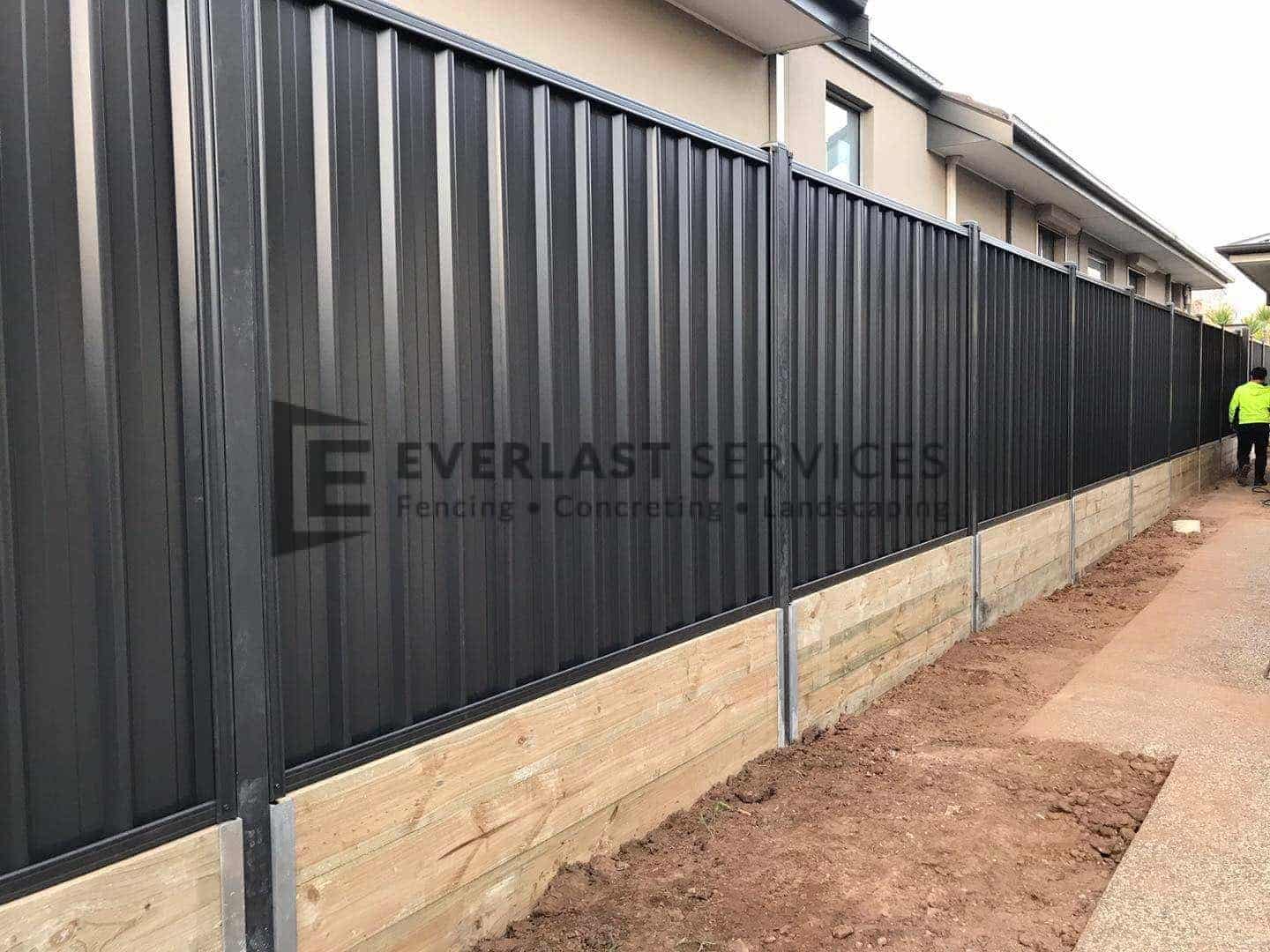 Custom Colourbond Fencing with Retaining Wall View 2
