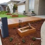 Front Decking with Garden Box and Cladded Retaining Wall