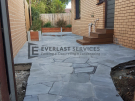 L278 – Everlast Landscaping stenciled concrete back door